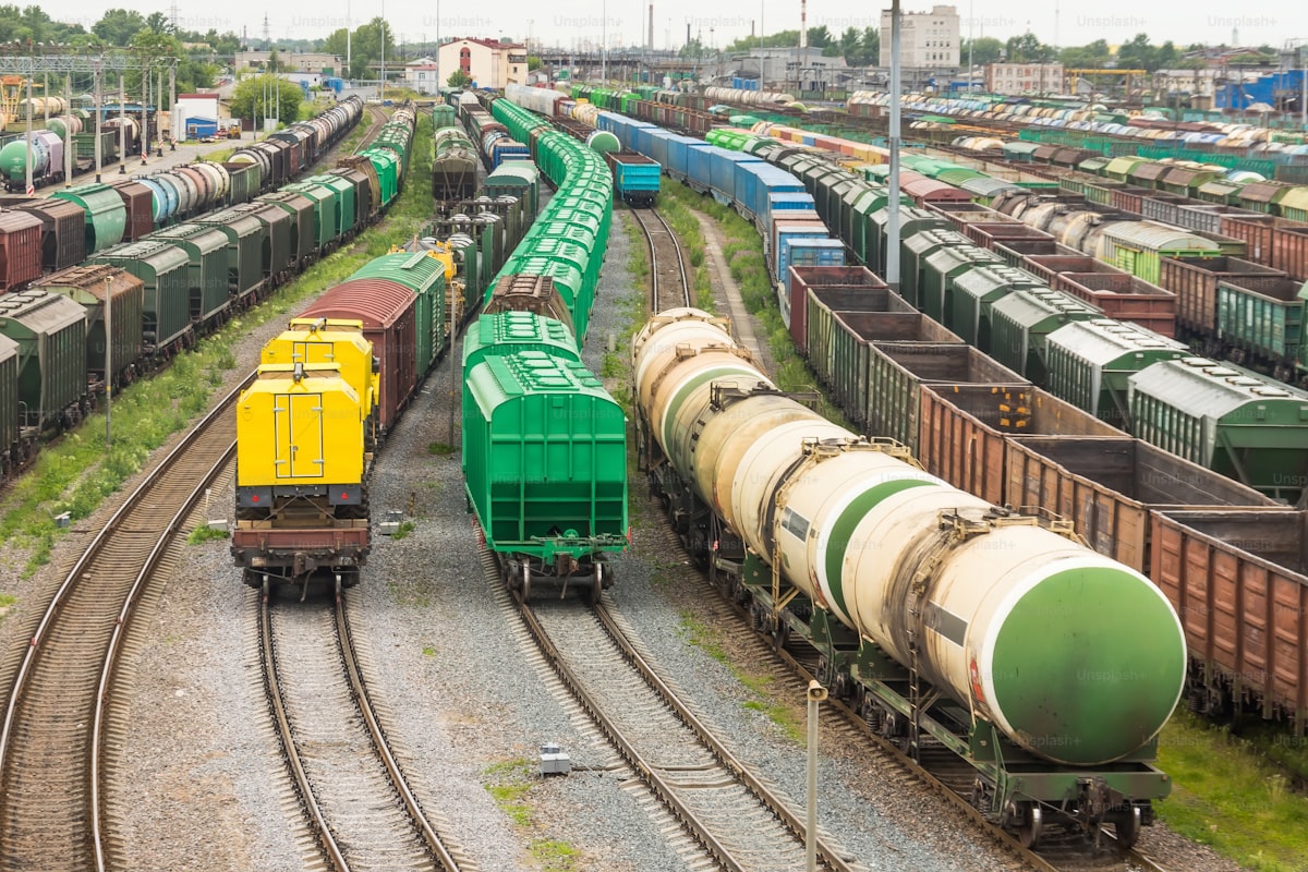 Freight railway sorting yard with multiple tracks and railcars